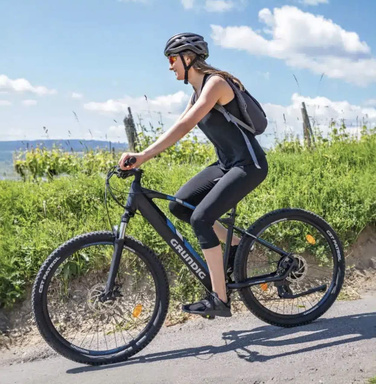 Een vrouw op een Grundig e275